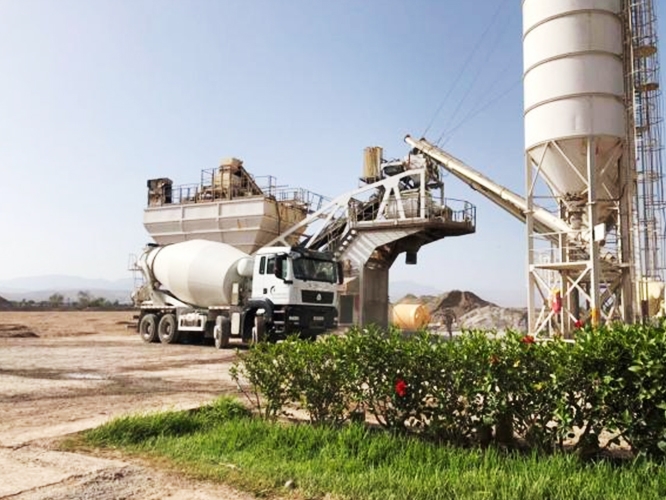 SITRAK cement mixer truck works at the construction site